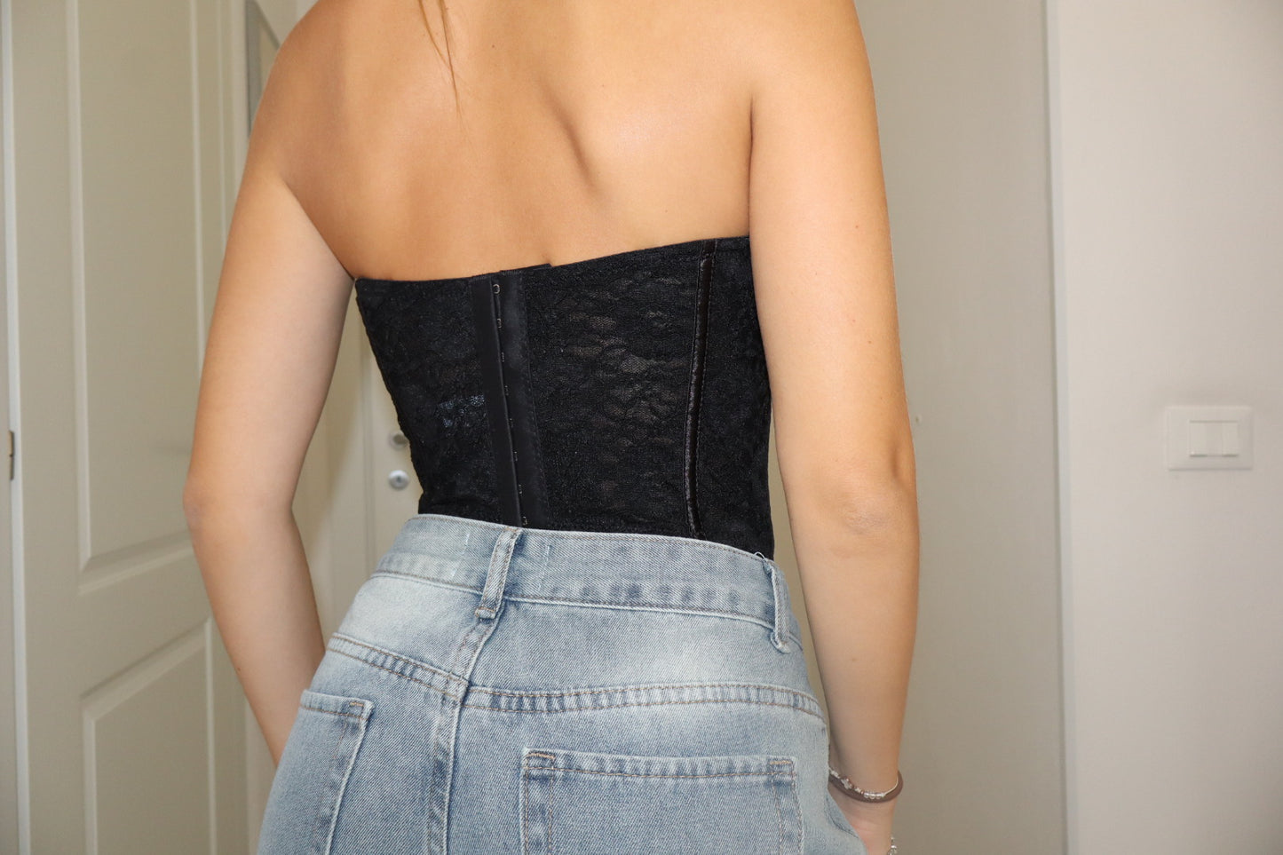Corsetto regolabile pizzo nero