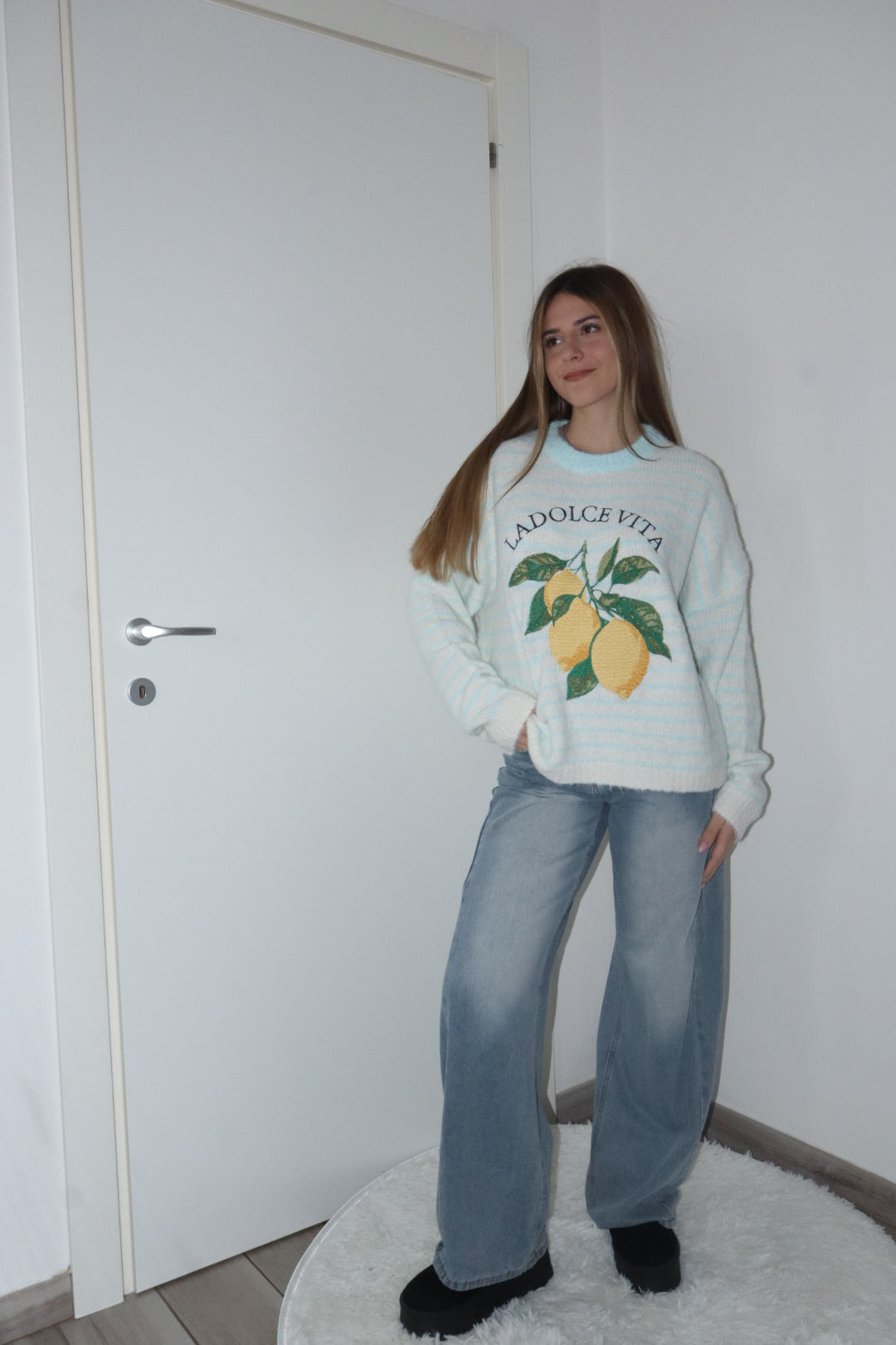 Pull dolcevita con limoni